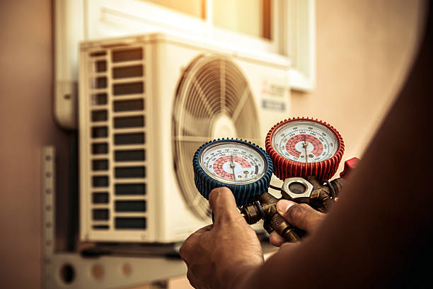 Professional Heat Pump Repair technician working in Jefferson, NH